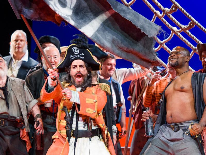 ENO's The Pirates of Penzance - Joshua Bloom as the Pirate King and Company. Photo by Tristram Kenton